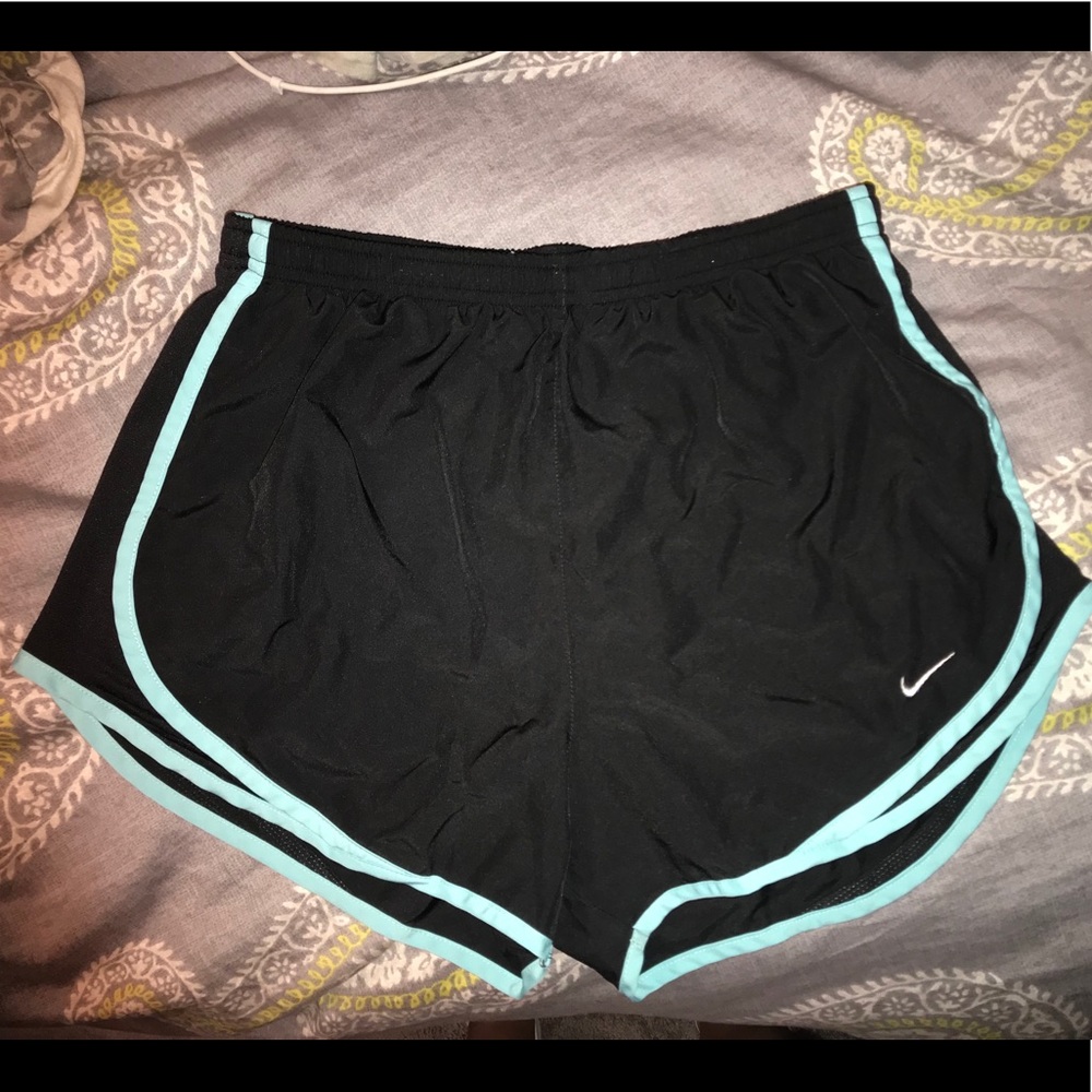 Black Nike shorts size M with blue trim